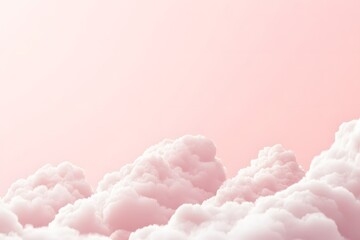 Soft pink clouds against a pastel sky, creating a serene and dreamy atmosphere.