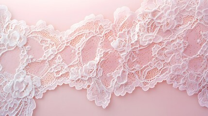Delicate pink lace with floral patterns on a soft background.