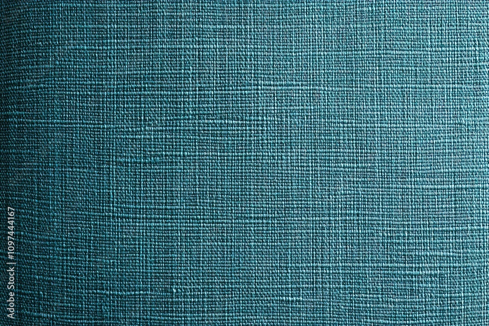 Poster A textured teal fabric background with a subtle woven pattern.