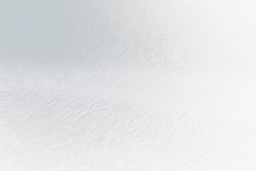 Obraz premium Close-up of dark textured surface with subtle light.