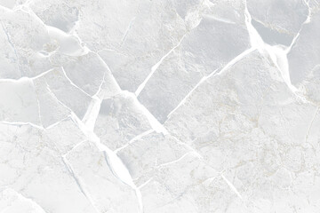 Close-up of dark, fractured stone texture.