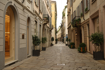  A glimpse of Via della Spiga on an early Sunday morning, the only time frame in the week not crowded with  enthusiastic , hectic and busy people on the street