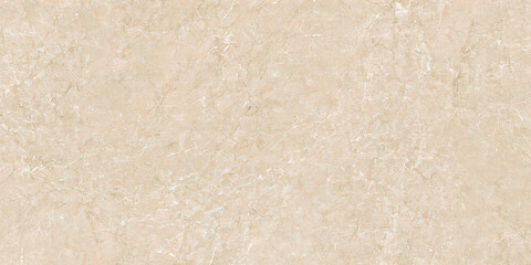 light tan marble surface, showcasing its smooth texture and natural patterns.