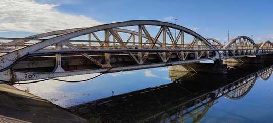 Naklejka premium old bridge over the river
