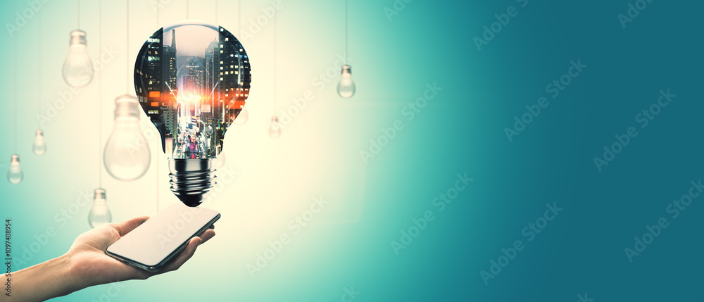 Poster Lightbulb with cityscape inside hovering above a smartphone in hand on gradient teal background. Symbol of innovation and technology.