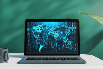 Laptop showing digital world map hologram on desk against green background. 3D Rendering