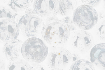 Close-up of many dark spheres with gold flecks, creating a textured Transparent Background.