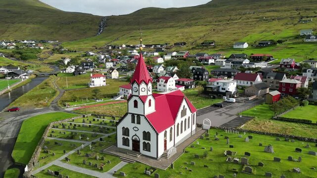 Aerial view of the beautiful church in Sandavagur, Vagar, Faroe islands