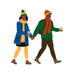 Walking hand in hand on a chilly day while enjoying warm drinks in winter attire