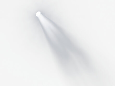 Bright spotlight beam illuminates darkness.