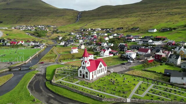 Aerial view of the beautiful church in Sandavagur, Vagar, Faroe islands
