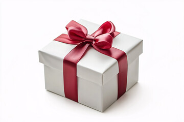 Obraz premium Elegant white gift box with a glossy red ribbon, ideal for holiday celebrations, birthdays, and wedding gifts. Perfect for invitations, cards, and marketing.