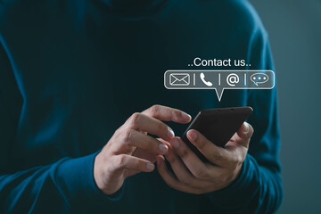 A person using a smartphone to communicate, showcasing various contact options like email and...