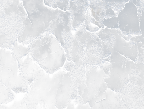 Close-up of dark, peeling paint on a textured surface.