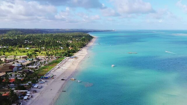Paradise scene of Maragogi, Alagoas, Brazil, with translucent turquoise waters, visible coral reefs, and golden sandy beaches, creating an ideal setting for moments of tranquility.