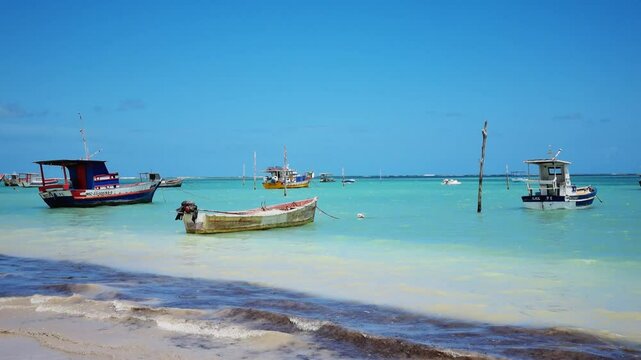 Serene beach of S&atilde;o Jos&eacute; da Coroa Grande, Pernambuco, Brazil, with turquoise waters gently meeting golden sands. A tropical paradise perfect for tranquil getaway visuals.