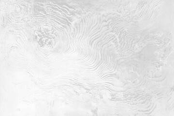 Abstract grayscale aerial view of layered rock formations.