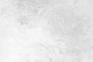 Abstract grayscale aerial view of layered rock formations.