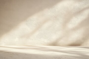 Minimalist beige wall background with soft shadows and textures for calm atmosphere