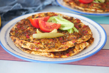 Enjoying Delicious and Flavorful Homemade Flatbreads that are Served with Fresh Toppings