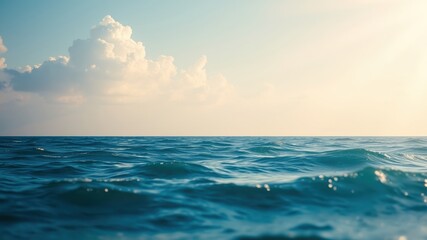 Fototapeta premium Serene Ocean Waterscape A Tranquil View of Gentle Waves Under a Cloudy Sky