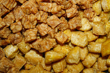 Texture background of fried tempeh and tofu
