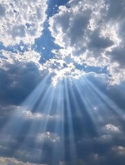 Fototapeta premium Sun shining through clouds