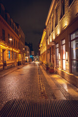 Warm Lights Illuminating a European Night Streetscape