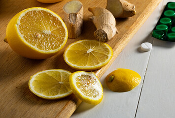 Lemon slices and ginger on the table