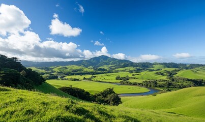 Scenic landscape featuring rolling green hills and a winding river.
