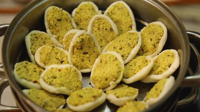 Steamed lentil fara in rice dough Indian style homemade dish.