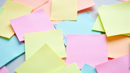 Fototapeta premium Creative Brainstorming with Colorful Pastel Sticky Notes in Grid Pattern