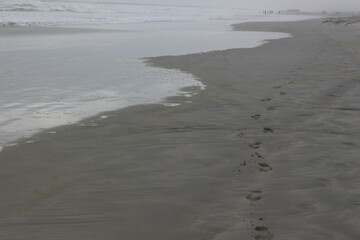 footprints on the beach