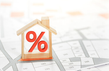 Mortgage rates business concept of investment housing real estate interest rates 3d home appraisal. planning savings money of coins to buy a home concept for property ladder, mortgage, real estate.