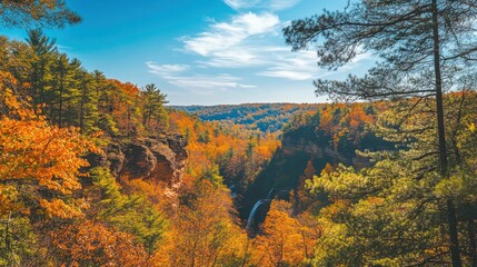 Discover the stunning autumn colors and waterfall at Hocking Hills State Park, an ideal spot for nature lovers and hikers