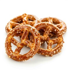 Crunchy pretzels sprinkled with salt on white background