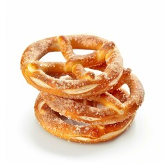 Fototapeta premium Stack of crunchy pretzels sprinkled with coarse salt on white background
