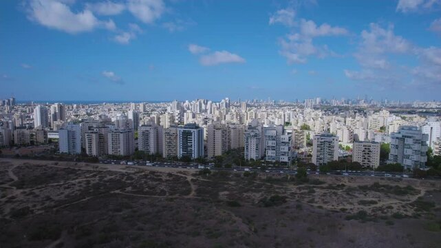 A view above the city of Holon and Tel Aviv in the background and the shores of the Mediterranean Sea - a beautiful autumn day