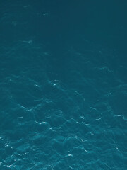 Fototapeta premium View from above of the surface of a large body of water, water, reflection, wide-angle, perspective, blue