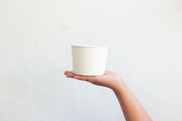 Paper Bowl 3
Empty paper bowl held in hand on white background