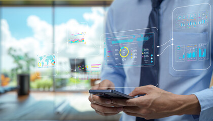 Businessman Using Smartphone with Digital Data Visualization Concepts