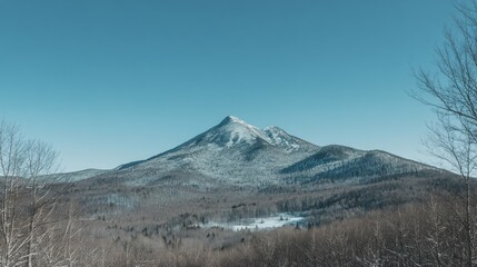 Snow dusted mountain peak winter landscape view