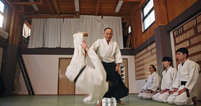 Master, student and class in Japan for karate, kung fu and practice with fitness, people and battle. Teaching, demonstration and sensei for martial arts, fight and self defense with exercise in dojo
