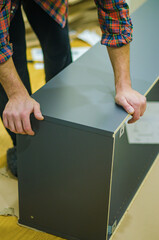 male assembling furniture at home. High quality photo