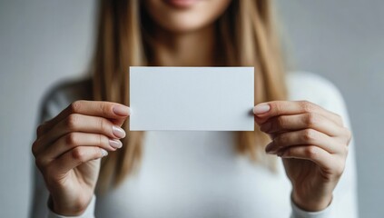Woman Holding Blank White Card