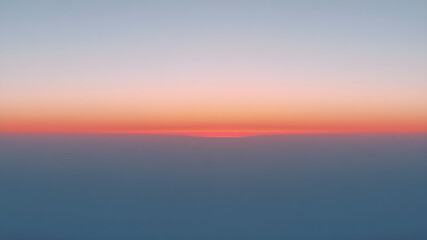 Obraz premium 8K Abstract Gradient Sky Background The sky changes from a golden orange reflected in sunlight in the center to a pale purple at the end of the sky. The subtle gradient creates a smooth and soft feel.