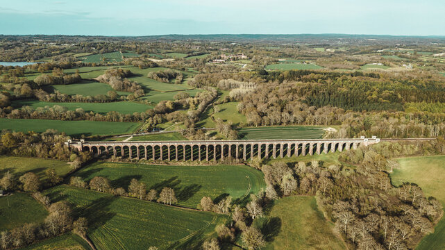 Aerial view of Ouse Valley Viaduct across Sussex farmland in spring