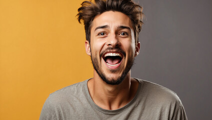 close up Excited smiling guy scream loud isolated on yellow studio background indoors 