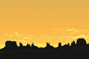 モニュメントバレーの黄昏時に見える壮大な岩のシルエット