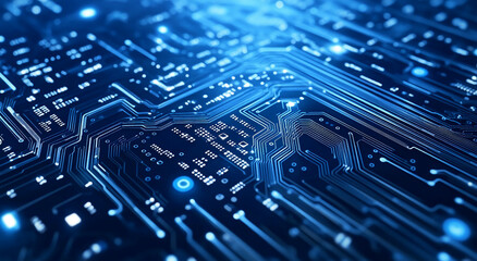 Detailed view of a complex electronic circuit board illuminated by blue light in a dark environment